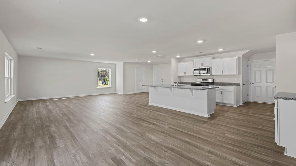 View of combination dining and living areas.