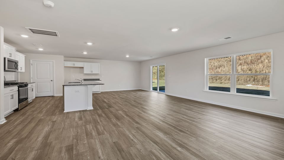 Large windows and recessed lighting.