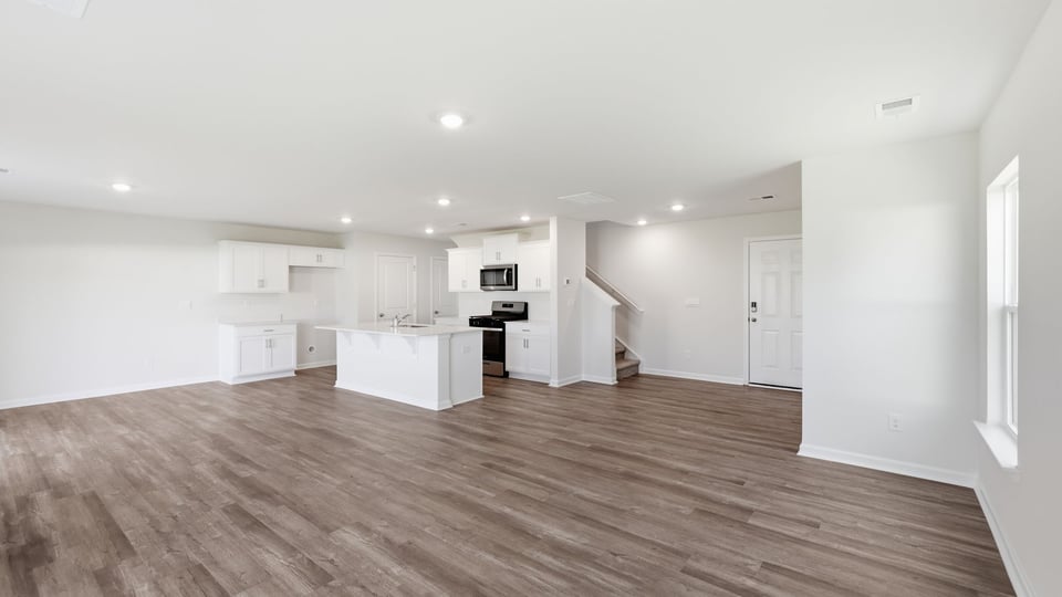 Family room with windows.