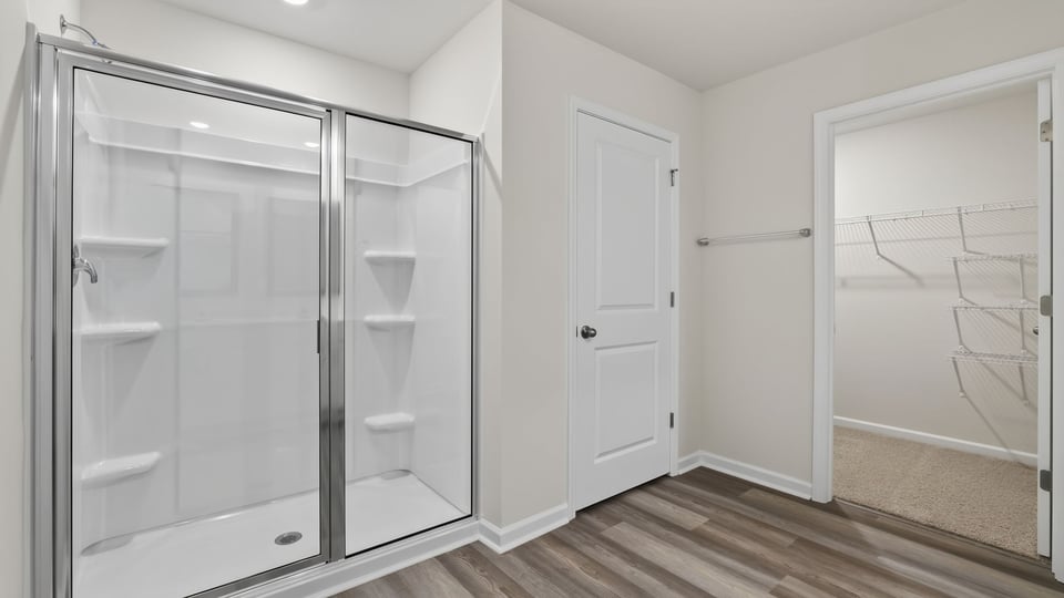 Primary bathroom with double vanity sinks.
