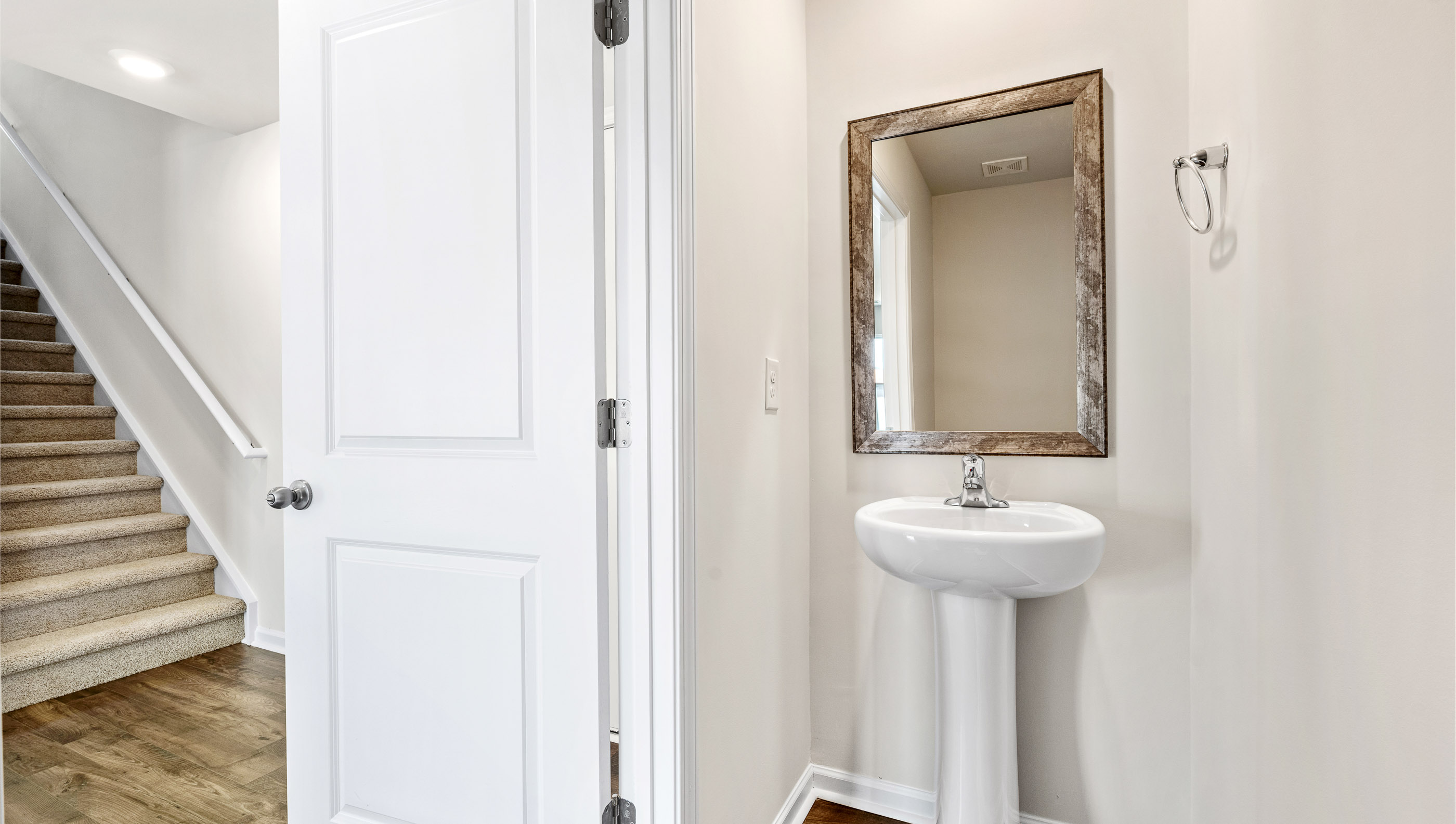Hald bathroom with sink.