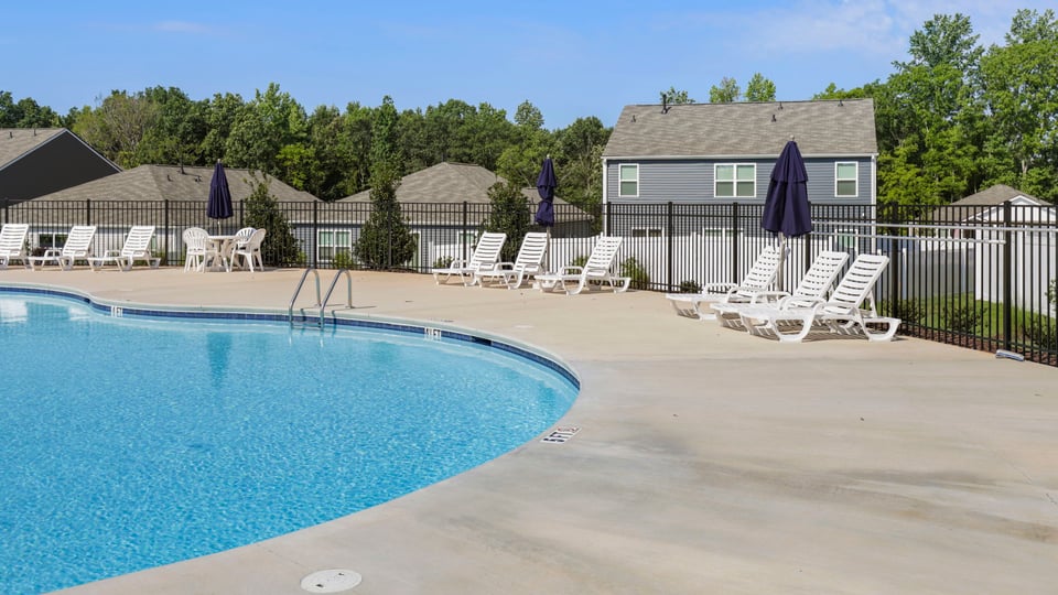 Pool amenity and clubhouse.