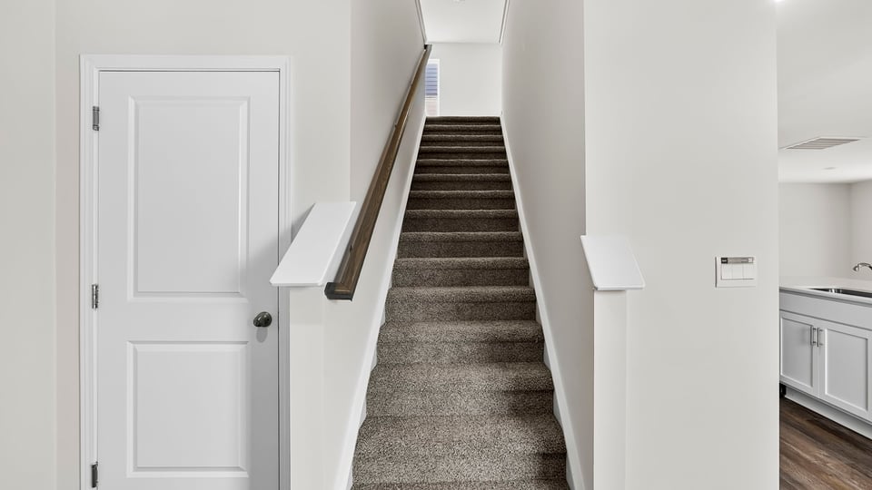 Stairs to second level.