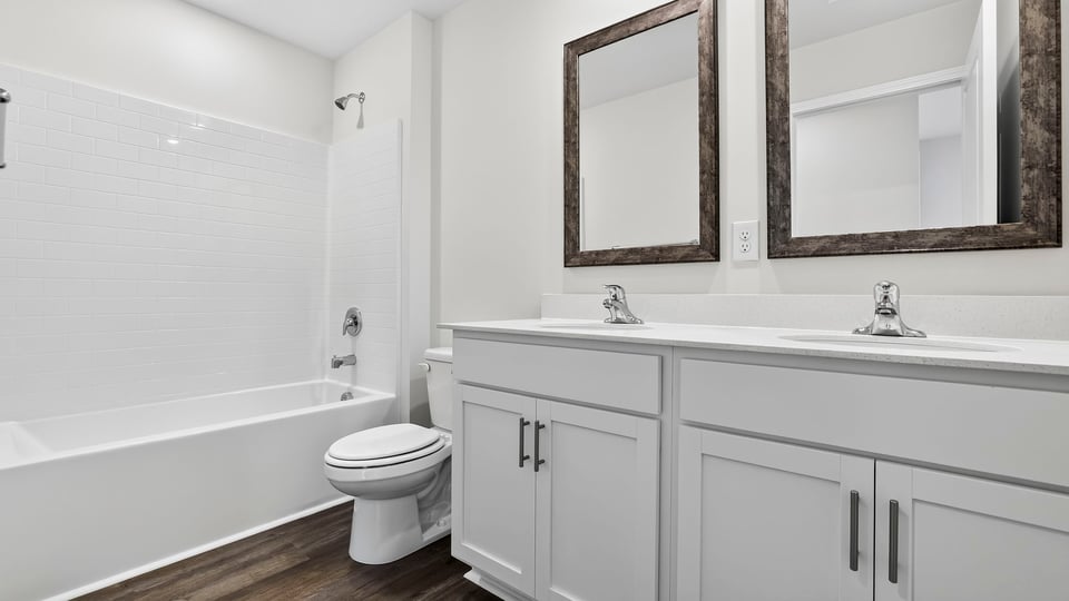 Bathroom with double vanity sinks.