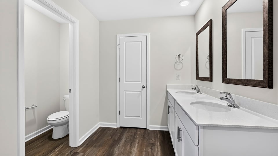 Primary bathroom with double vanity sink.
