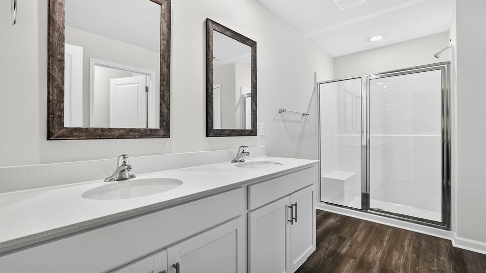 Primary bathroom with double vanity sink.