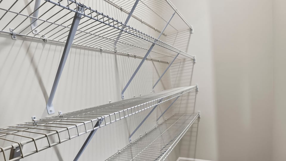 Primary closet with window.