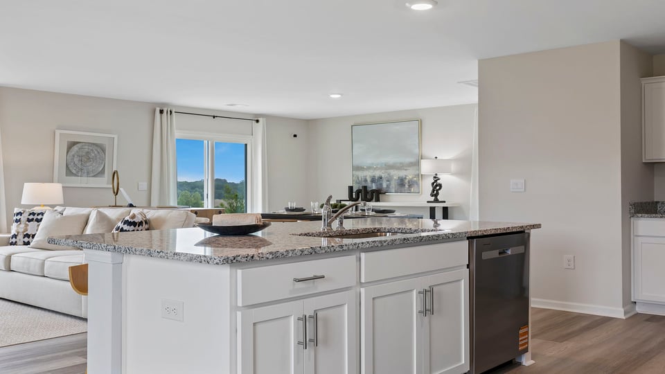 Kitchen with island and cabinets.