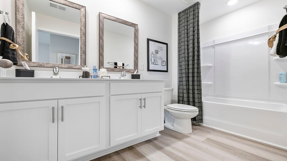 Bathroom with double vanity sinks.
