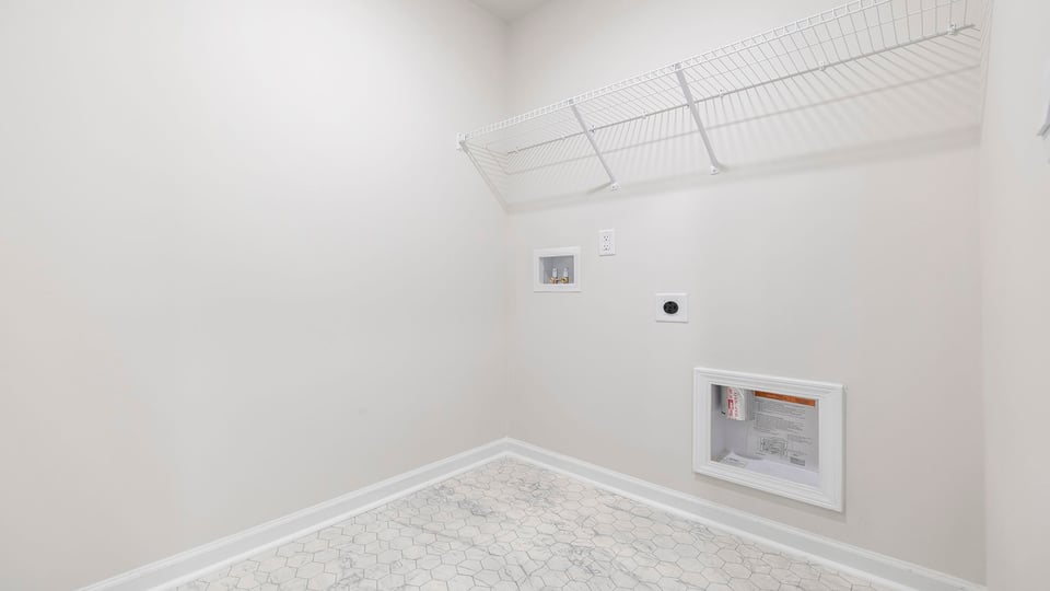 Walk-in laundry room.