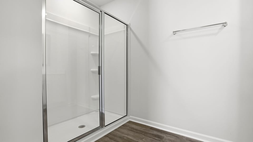 Primary bathroom with double vanity sinks.