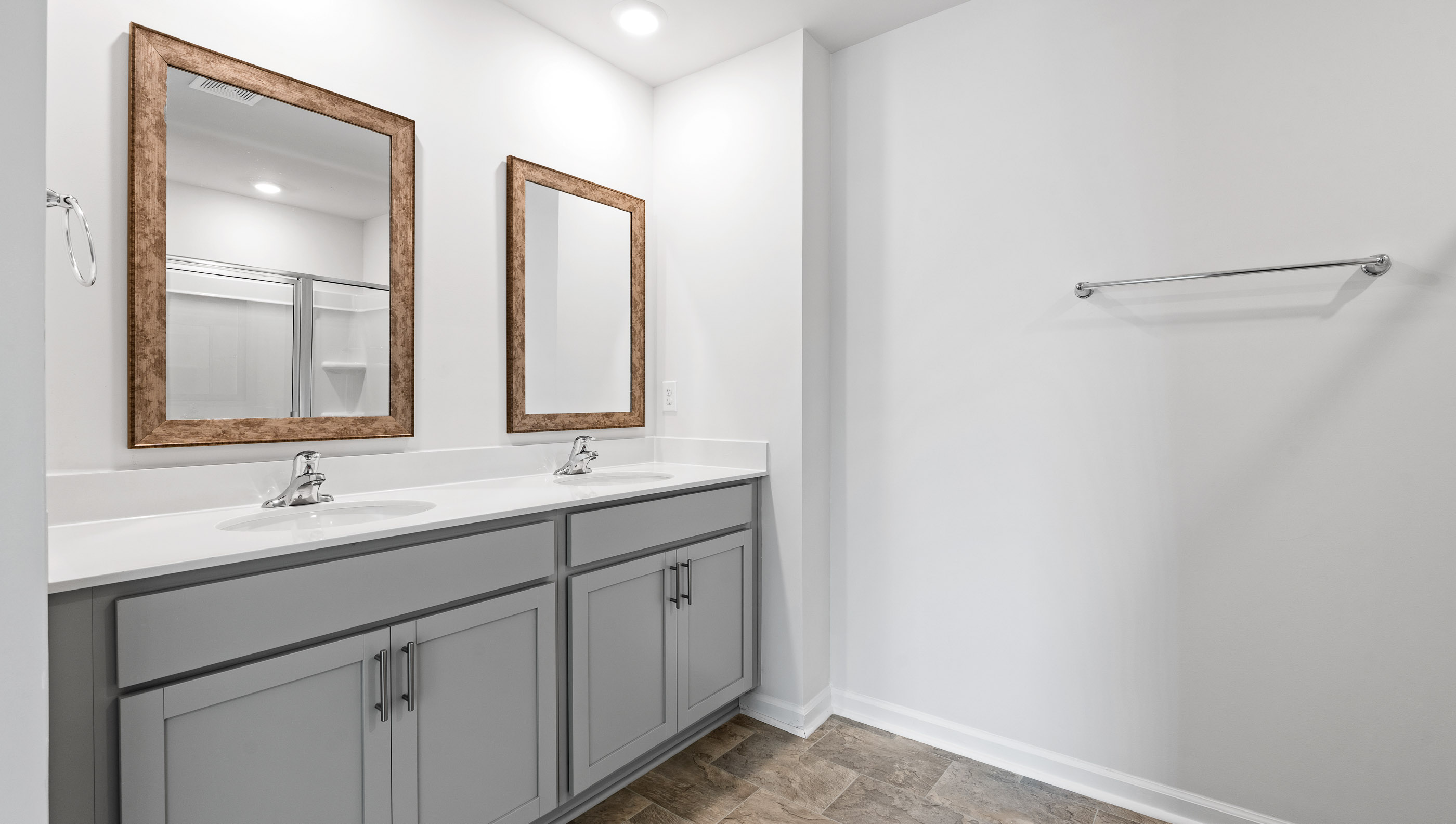 Bathroom with double vanities.