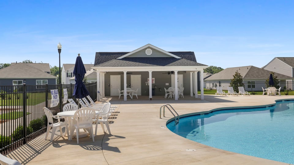 Pool amenity and clubhouse.
