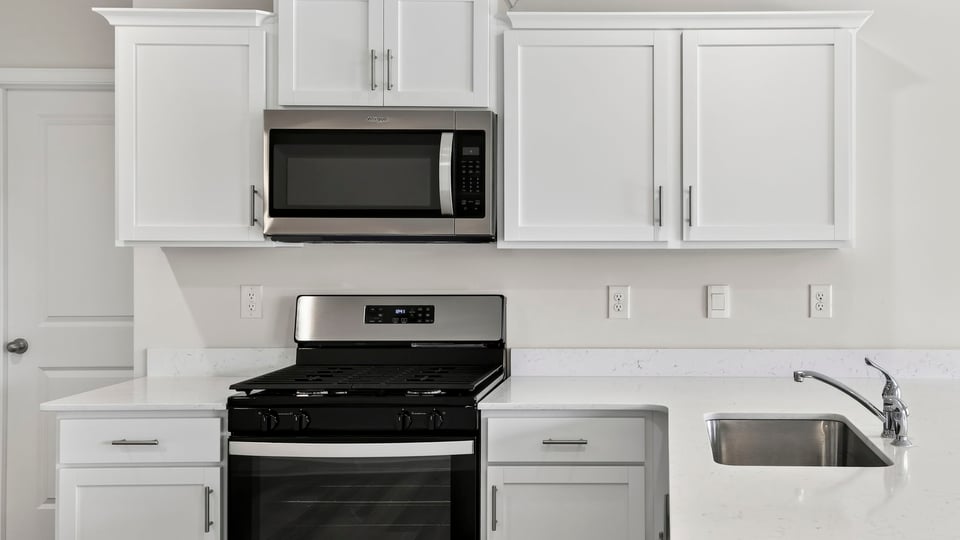 Kitchen with cabinets.