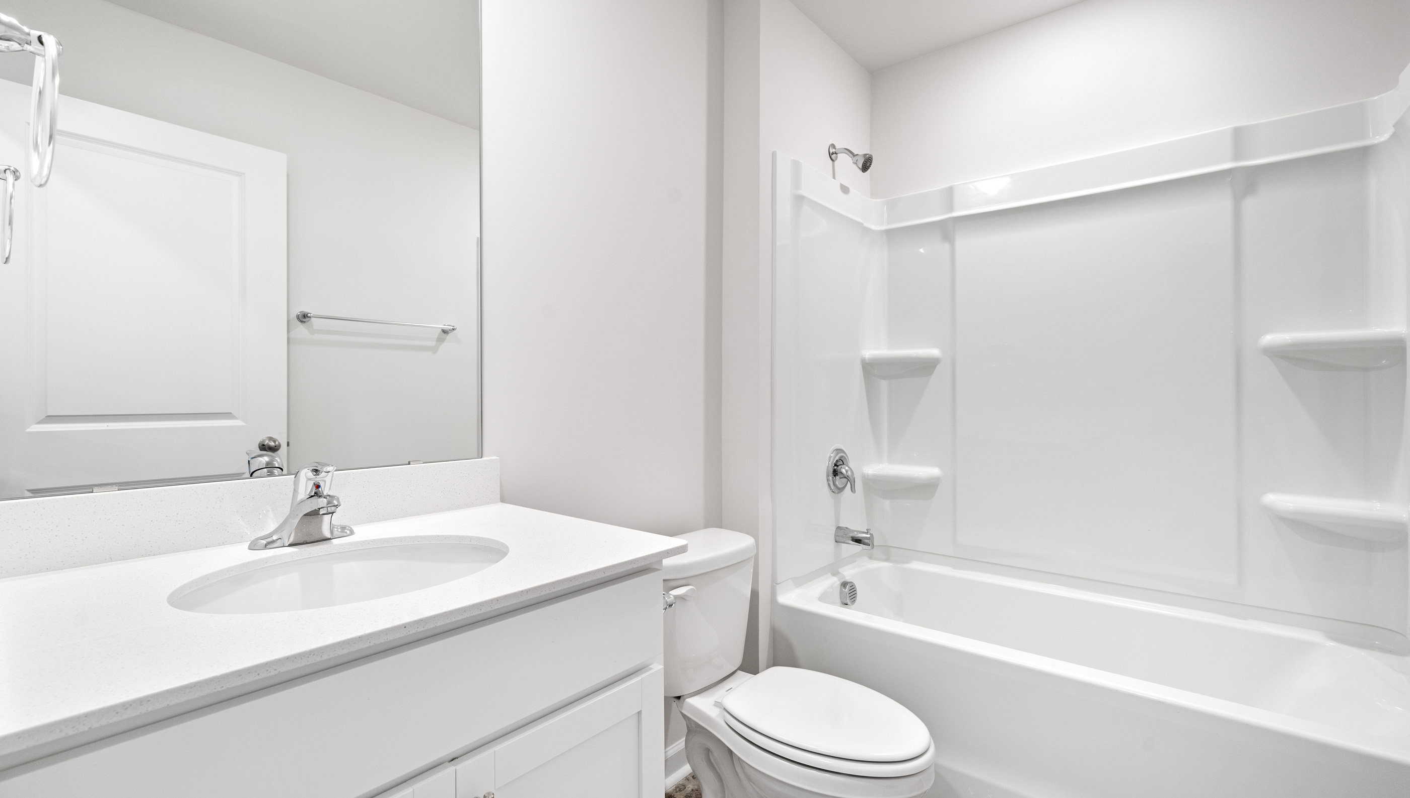 Bathroom with toilet and sink.