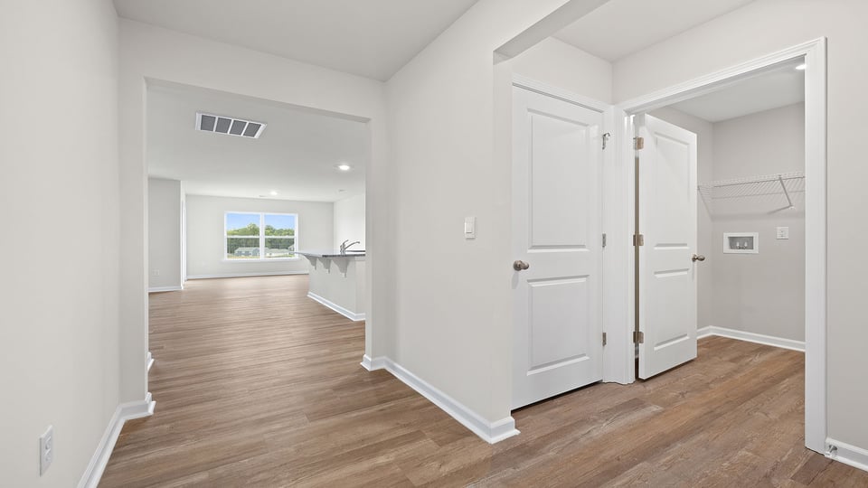 Hallway with view of rooms.