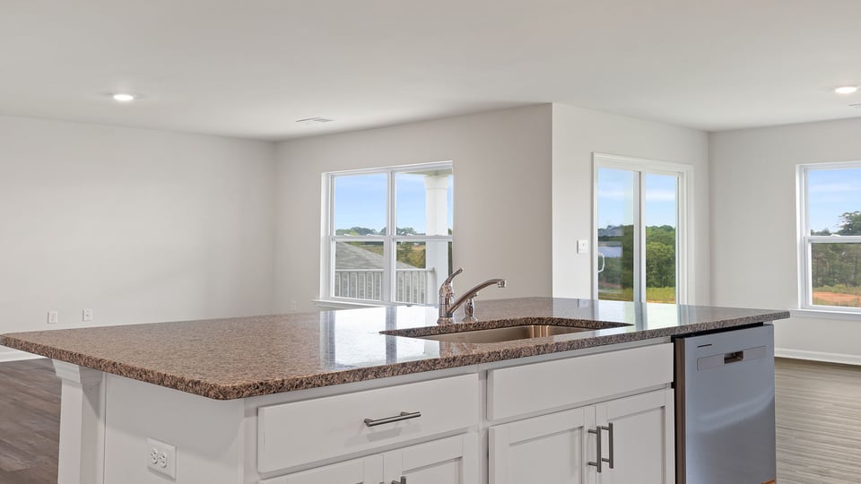 Kitchen with stainless steel appliances.