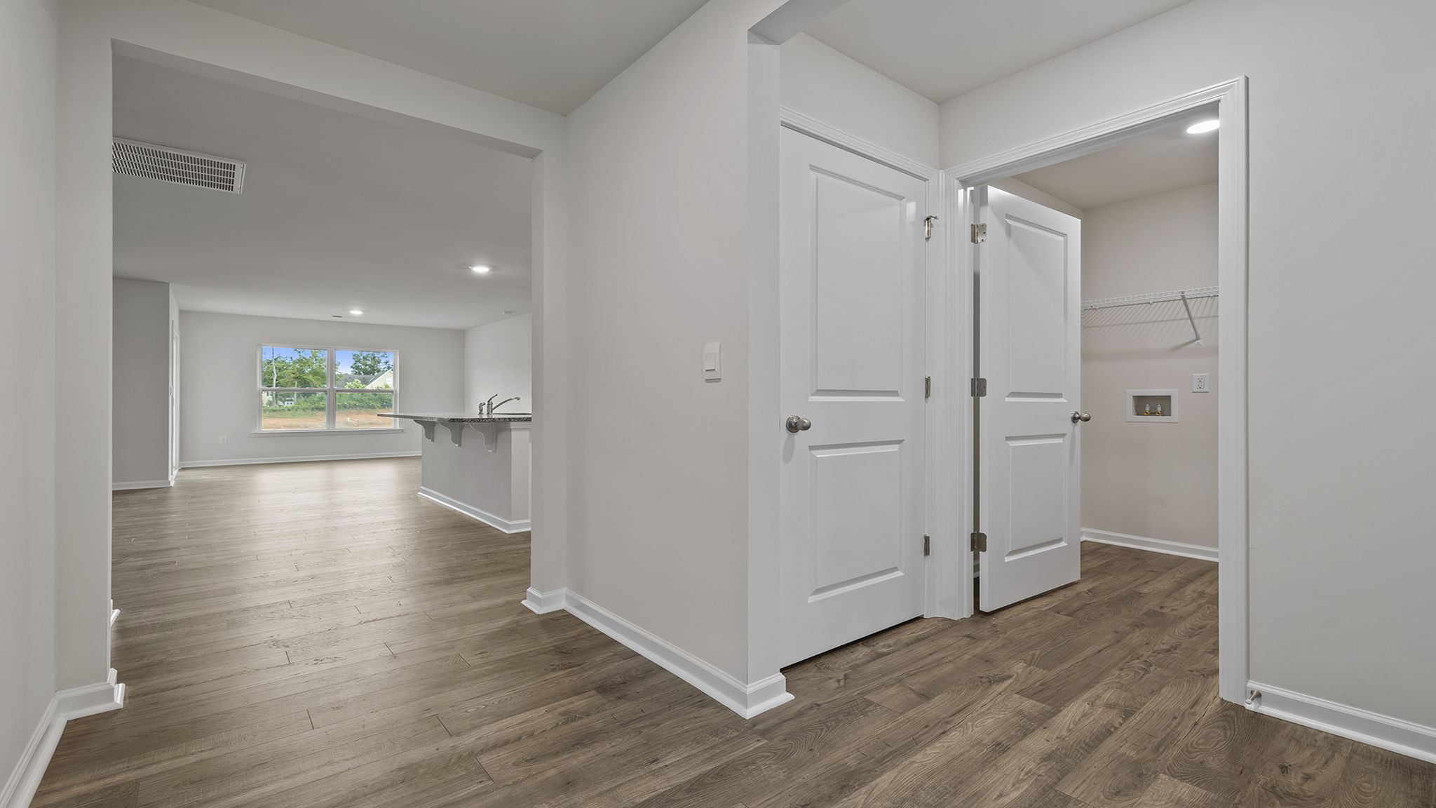 View of hallway and location of the laundry room.