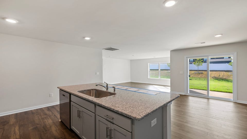 View of island and door to the back yard.