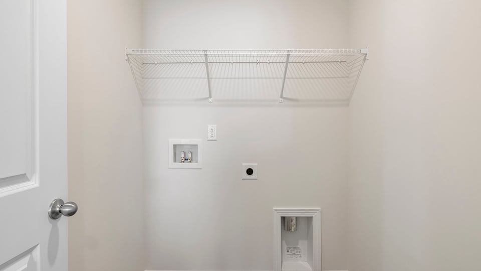 Walk-in laundry room.