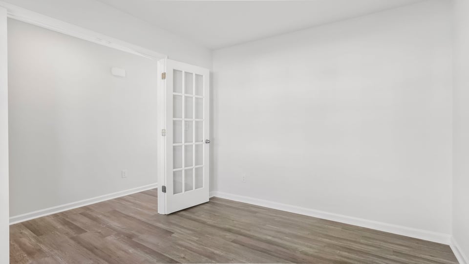 Study accented by French doors.