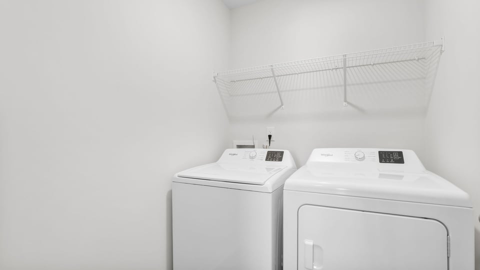 Walk-in laundry room.