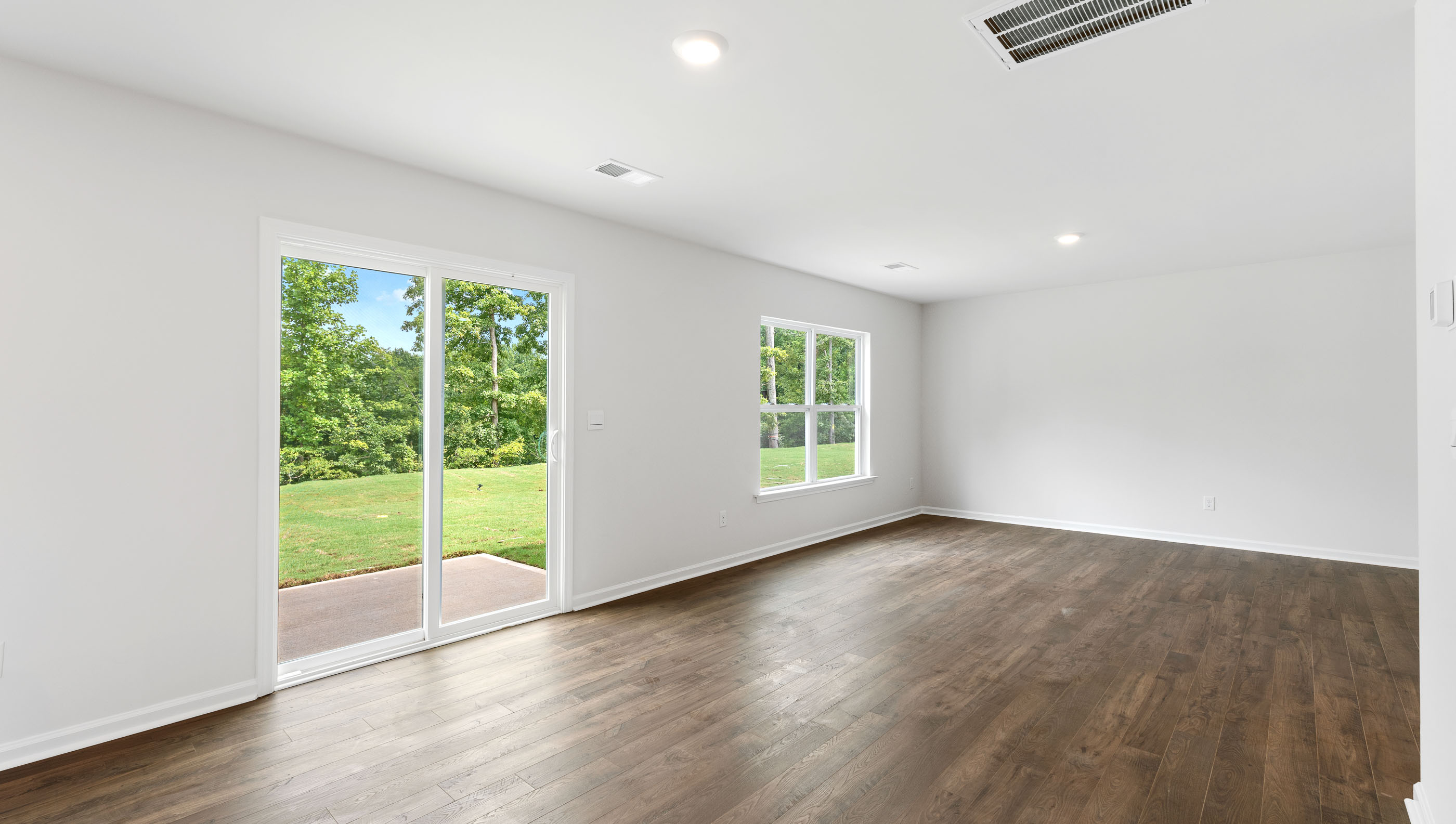 Family room with windows.