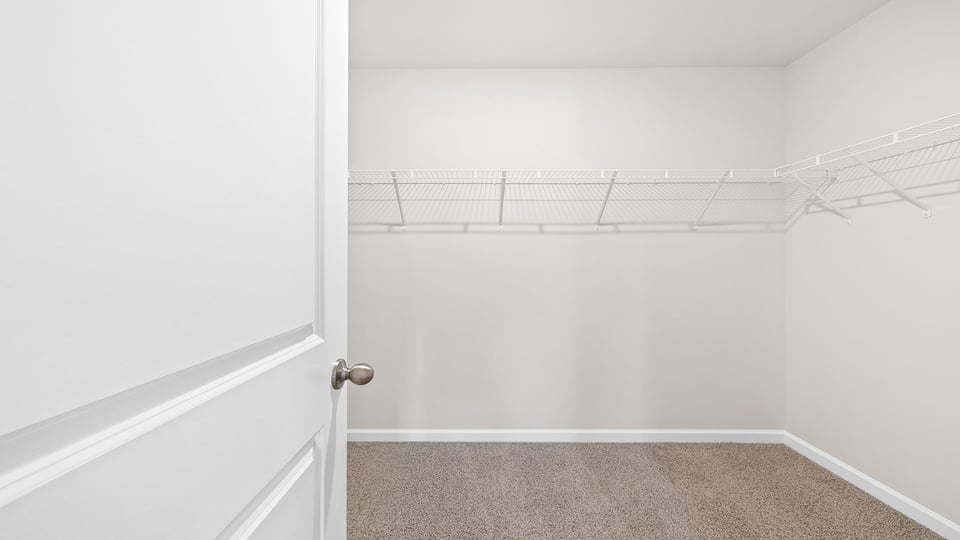 Primary walk in closet.