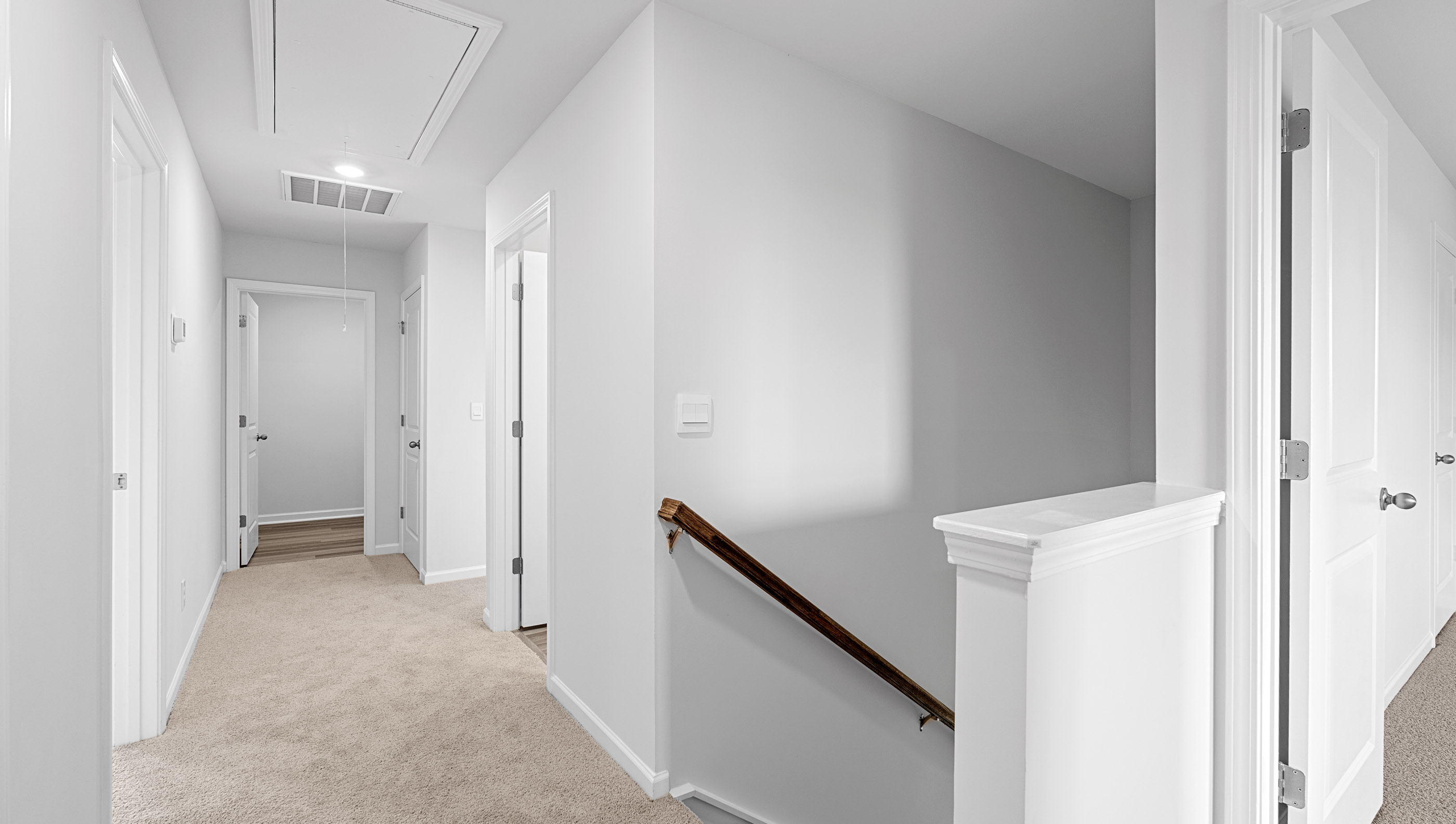 Upper level landing and view of hallway.