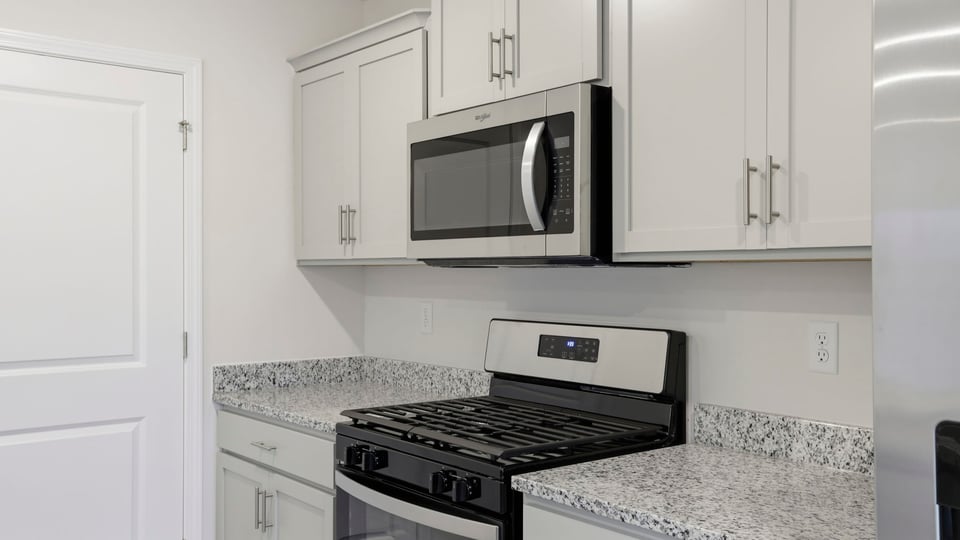 Gas range and built in microwave.