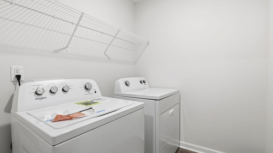 Walk-in laundry room.
