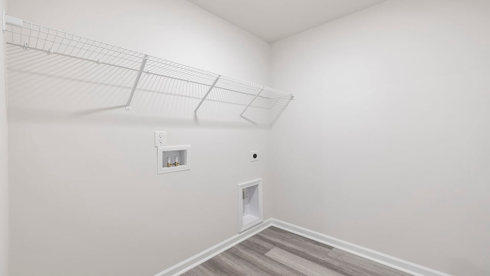 Walk-in laundry room.