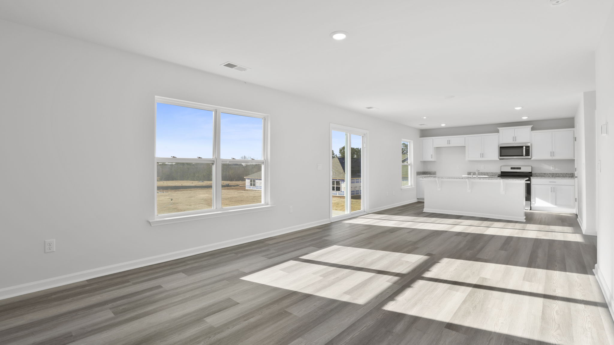 View of open floor plan with lots of windows and natural light.