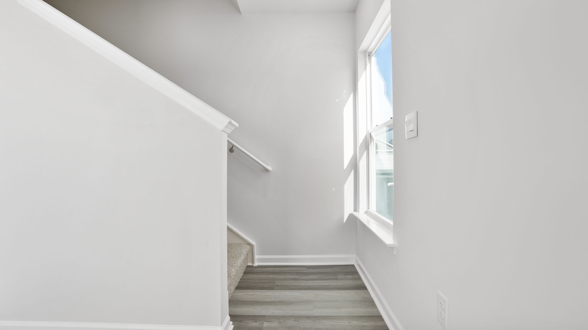 View of stairwell to the upper level.