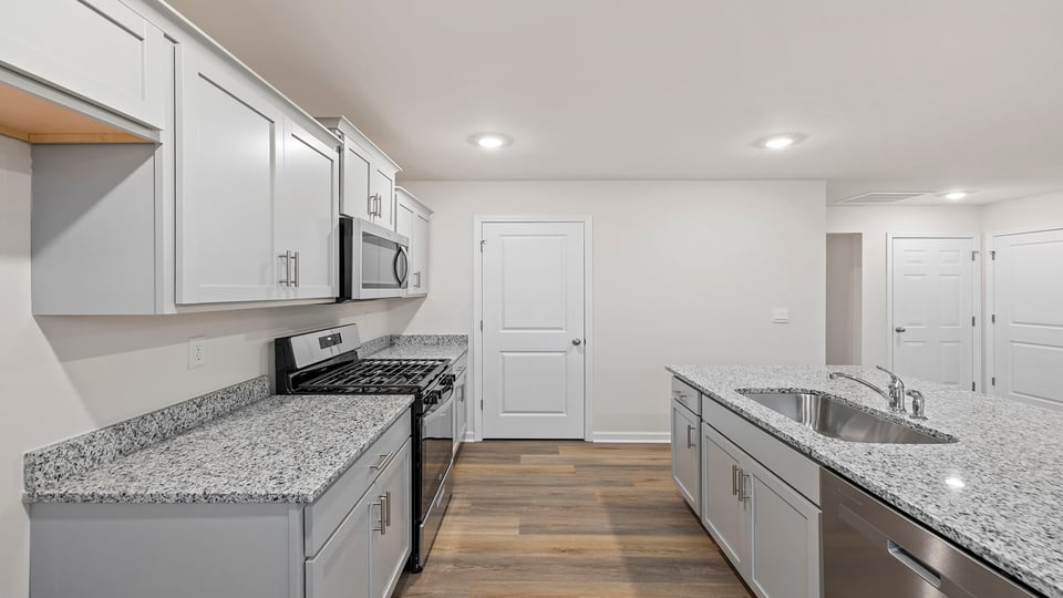 Kitchen island with granite countertops.