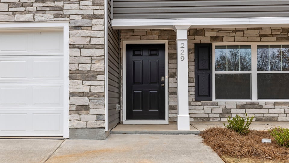 Front exterior of Penwell with front porch.