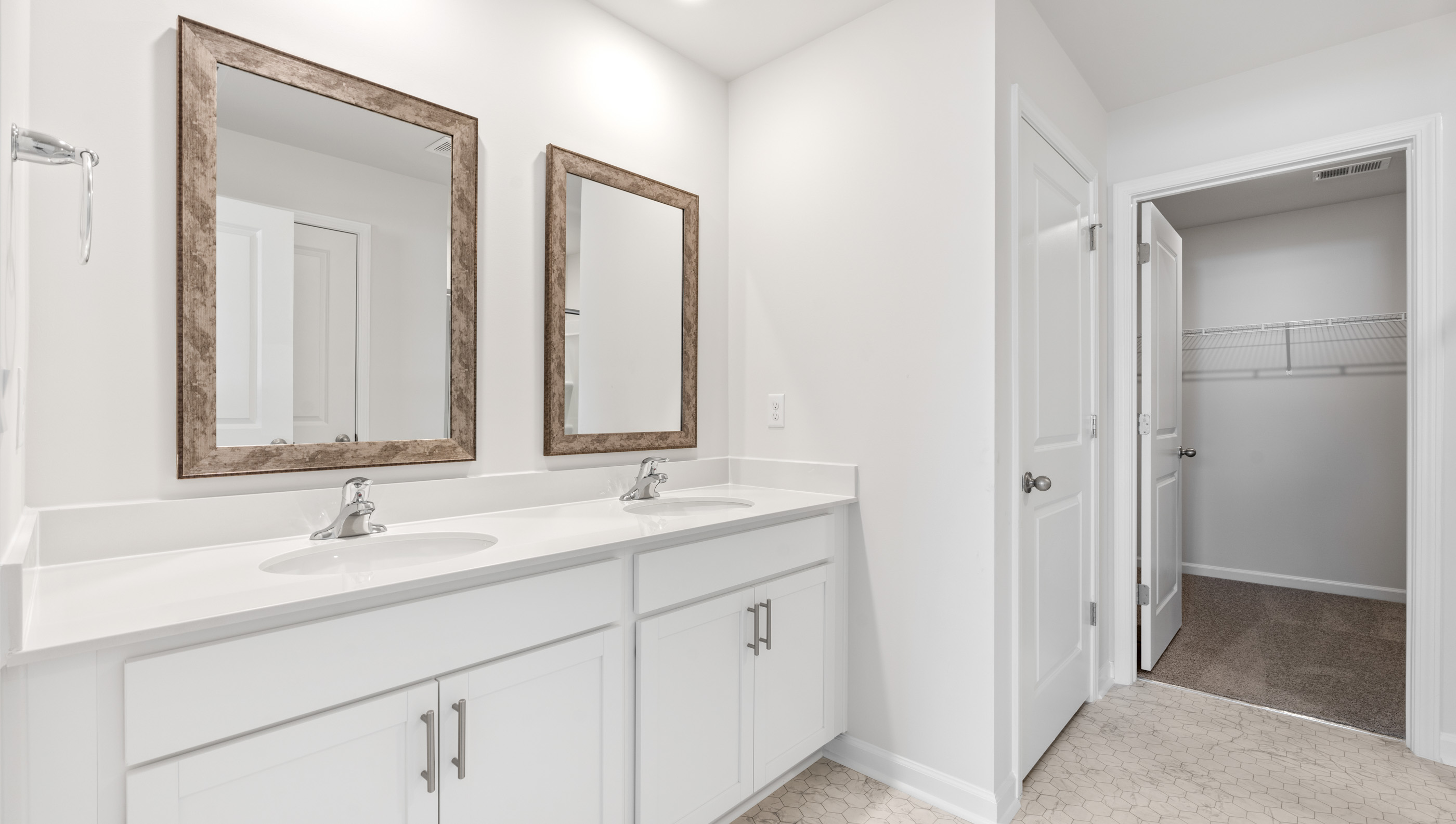 Bathroom with double vanity sink.