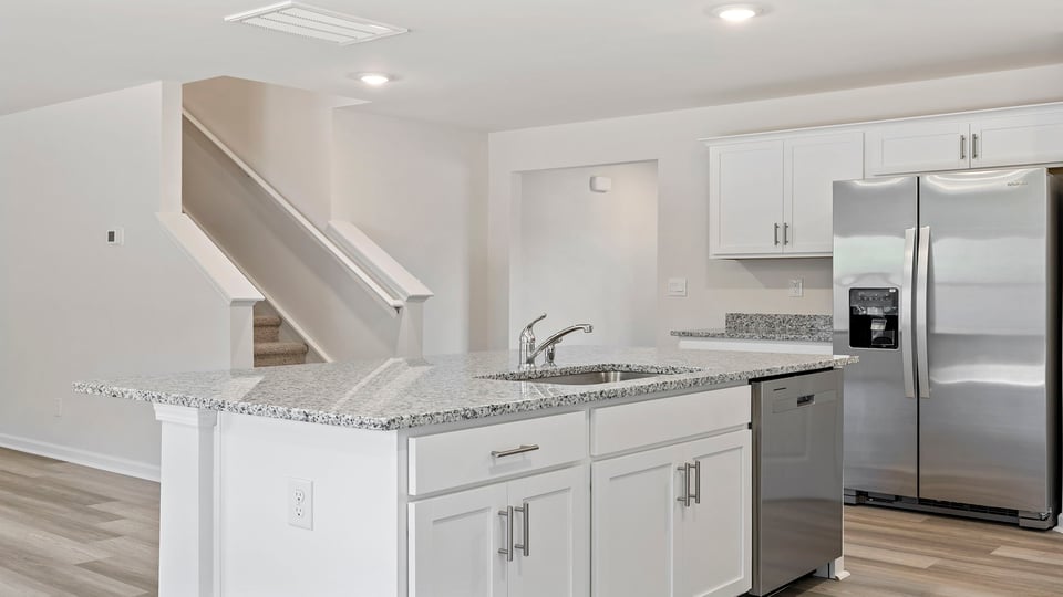 Kitchen island with granite countertops.