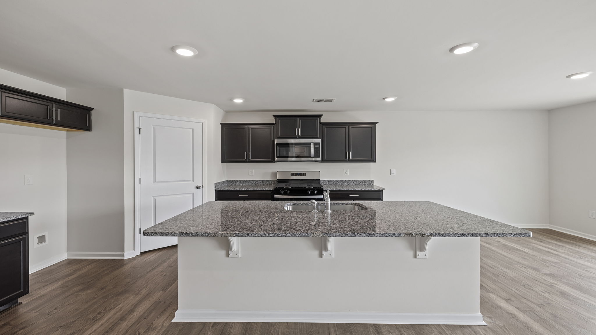 Kitchen island with granite countertops.