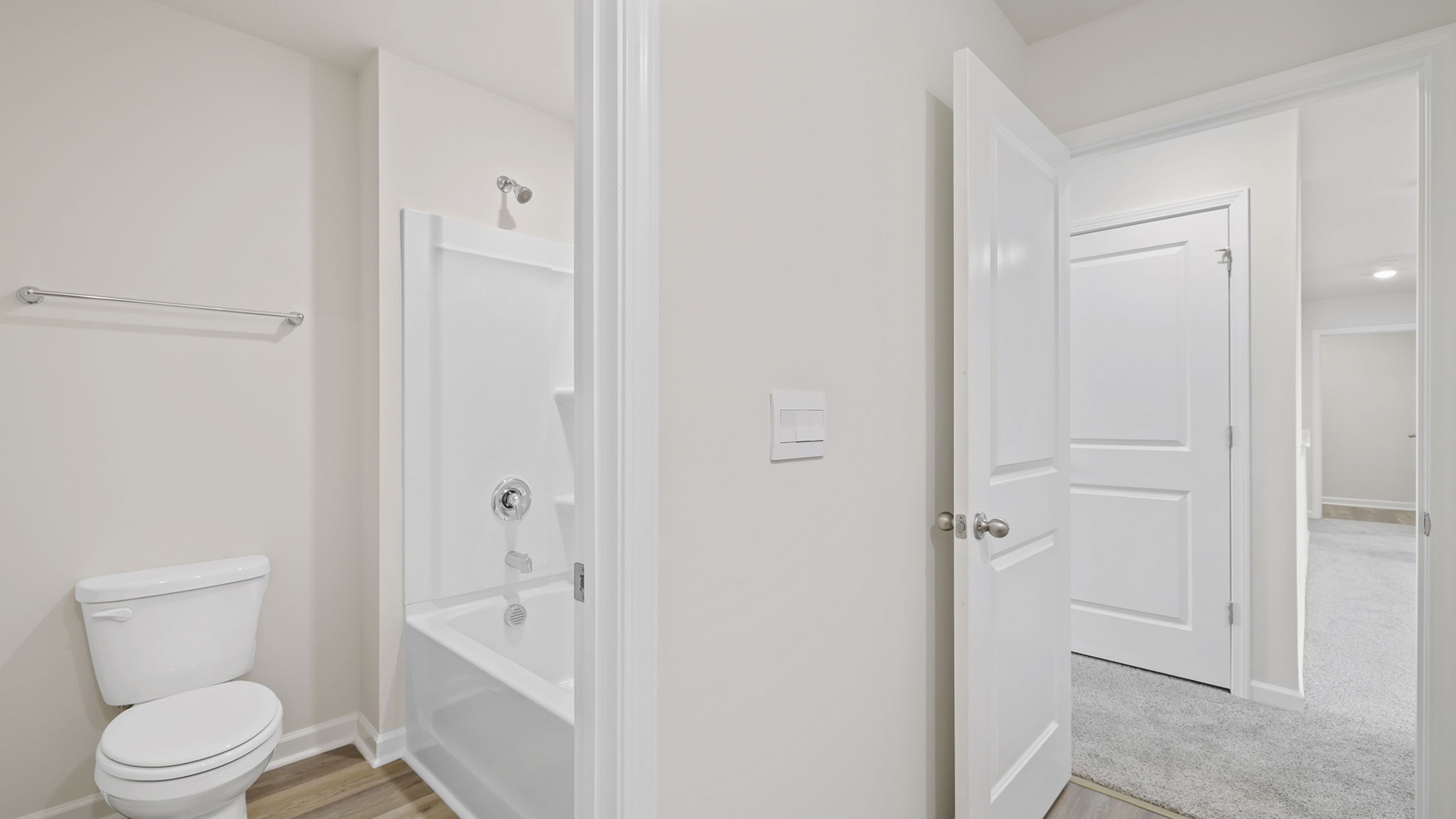 Hall bathroom with separate shower area.