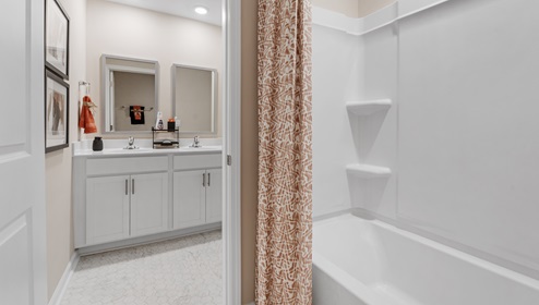 Bathroom with double vanity sinks.
