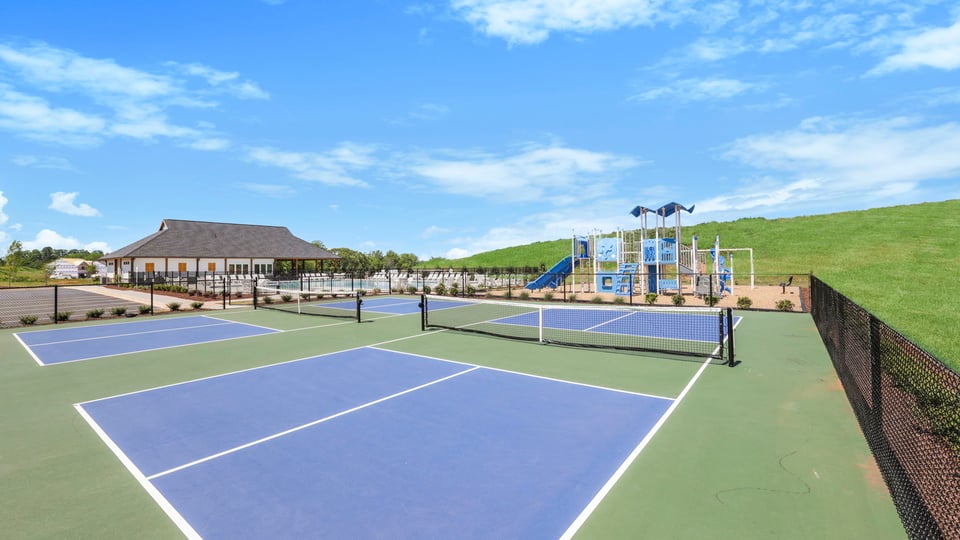 Amenity center with pickleball court.