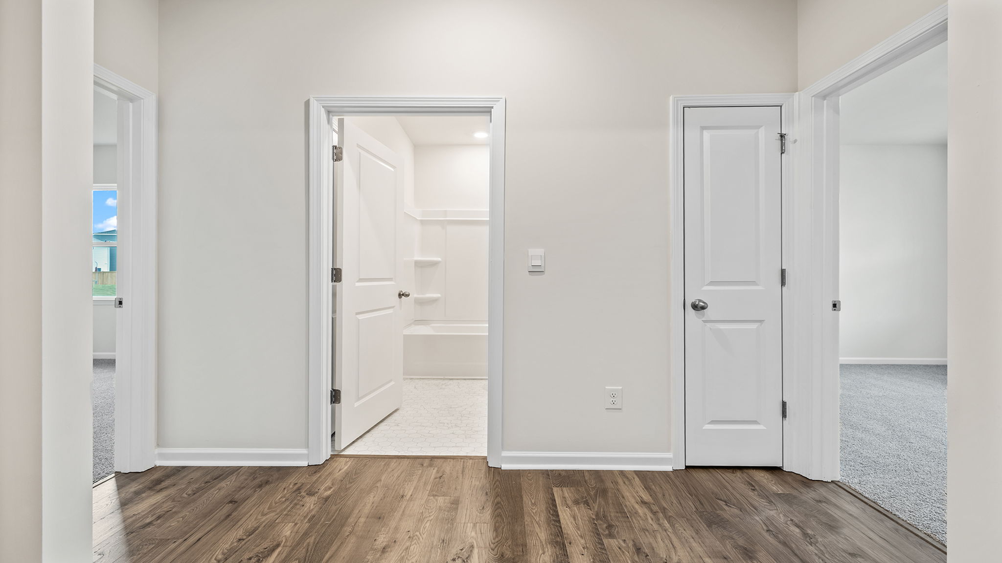 View of bedroom and hall bathroom.