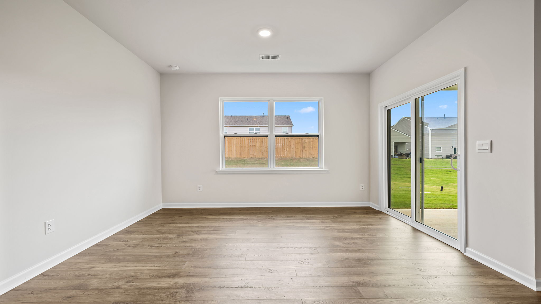 Dining area with door to outside patio.