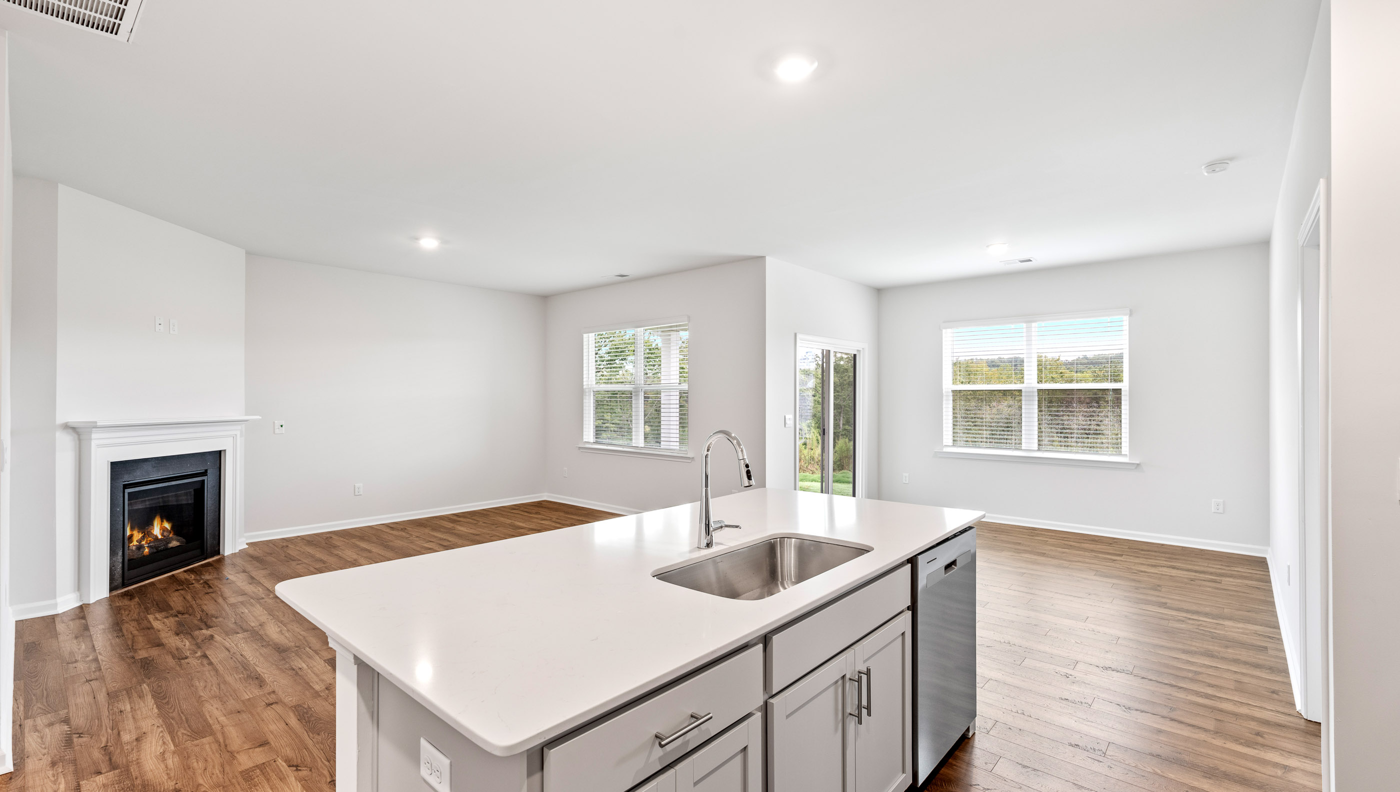 View from kitchen of family and dining areas.
