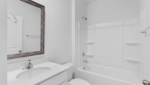 Bathroom with tub and sink.