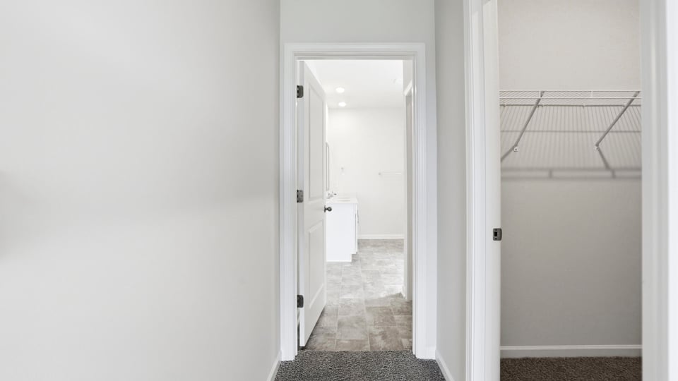 Primary bathroom with double vanity sinks.