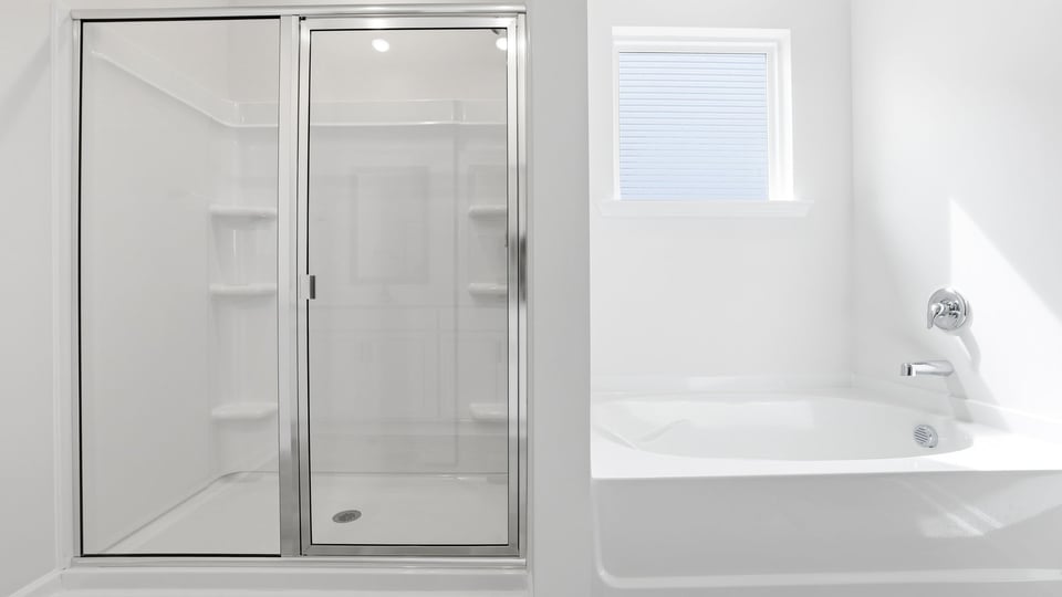 Primary bathroom with double vanity sinks.