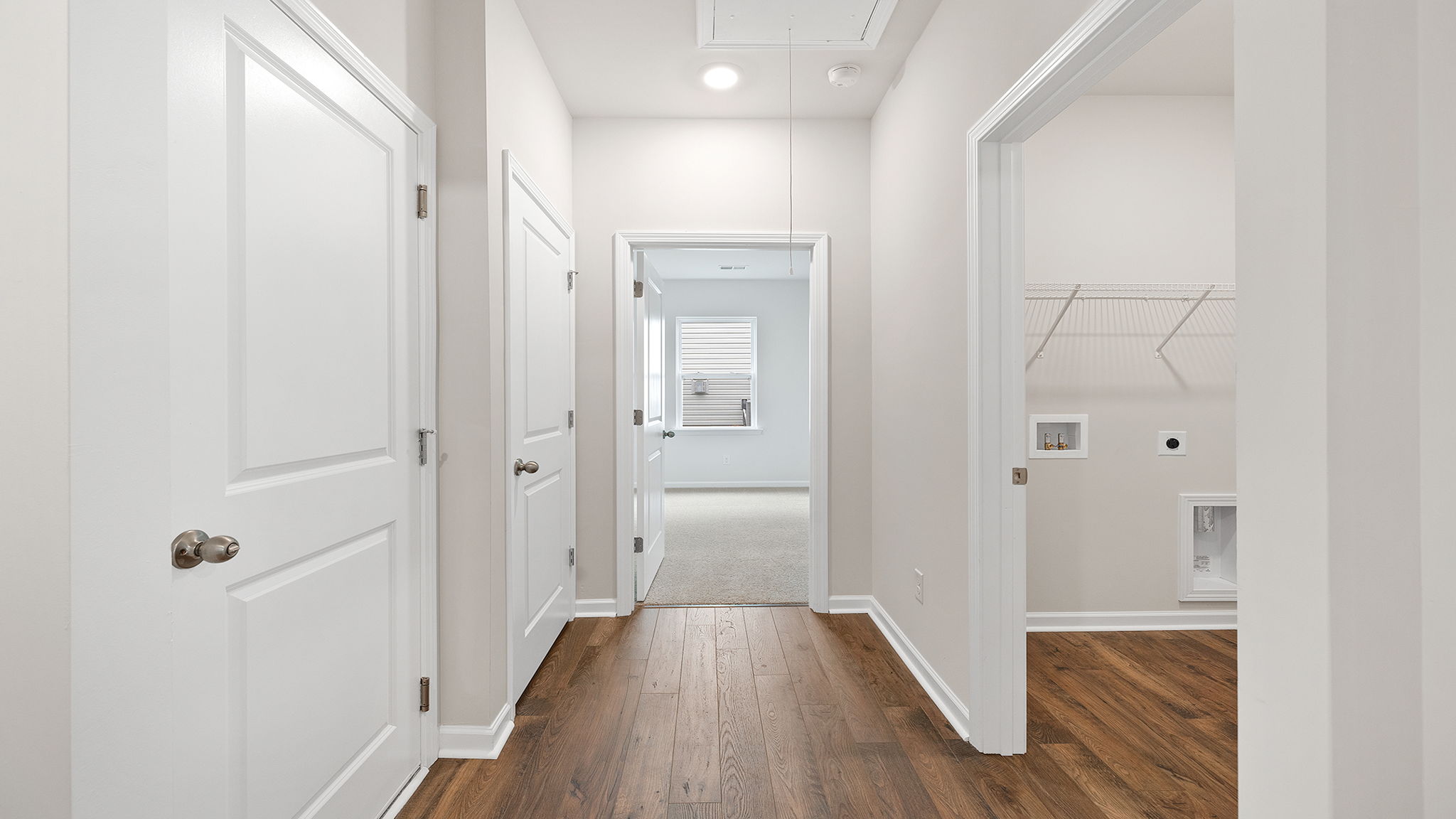 View of hallway showing laundry room.