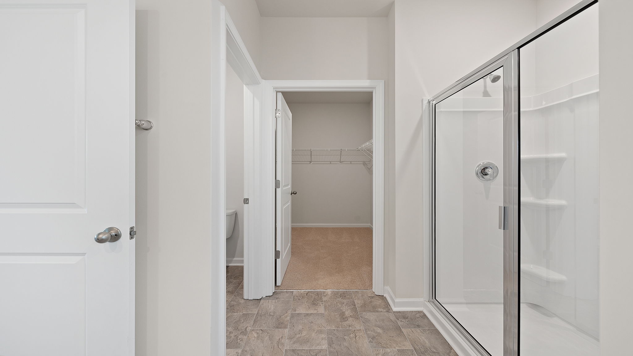 Primary bathroom walk-in shower.